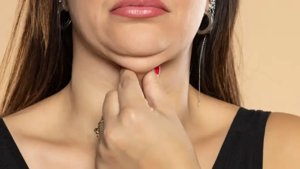 An image of a woman with double chin, sad, worried : Non Surgical Double Chin Removal Treatment in Waltham Forest, UK
